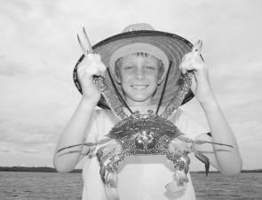 Young Zac Mason displays a fantastic blue swimmer crab, a welcome addition to any seafood meal.